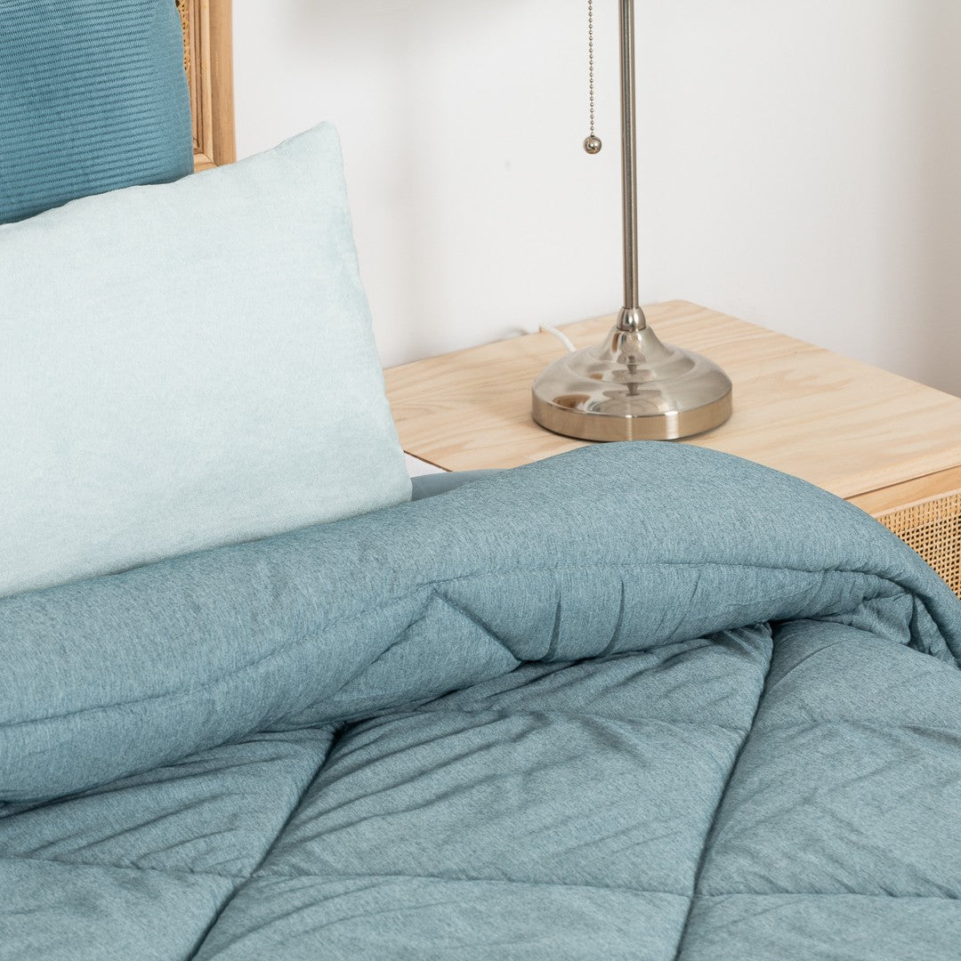 Edredom liso com efeito desgastado