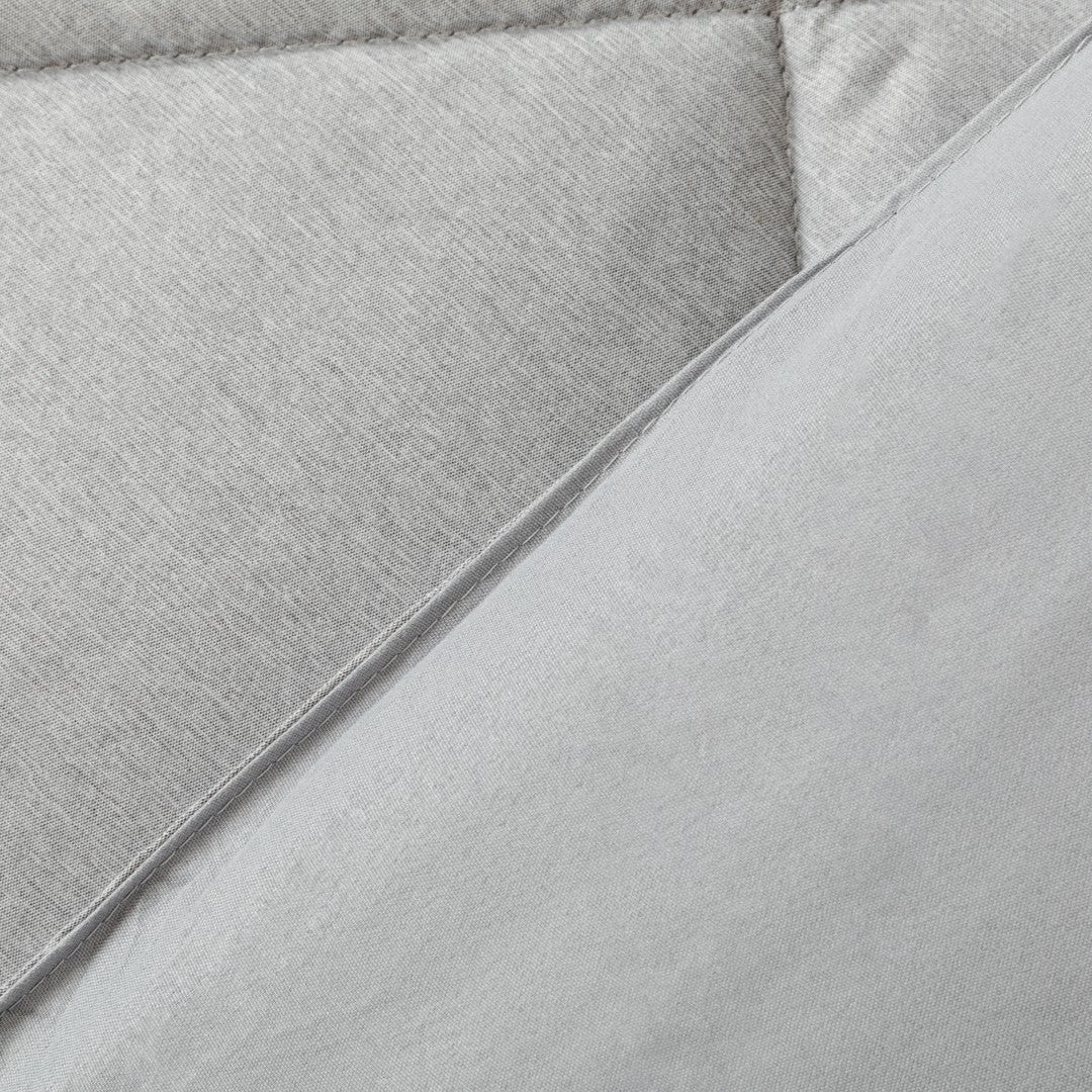 Edredom liso com efeito desgastado