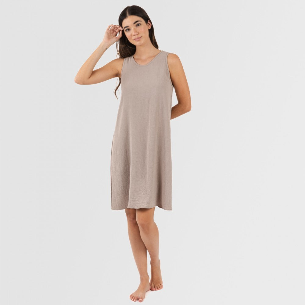 Vestido curto com alças, em musselina de algodão lisa.