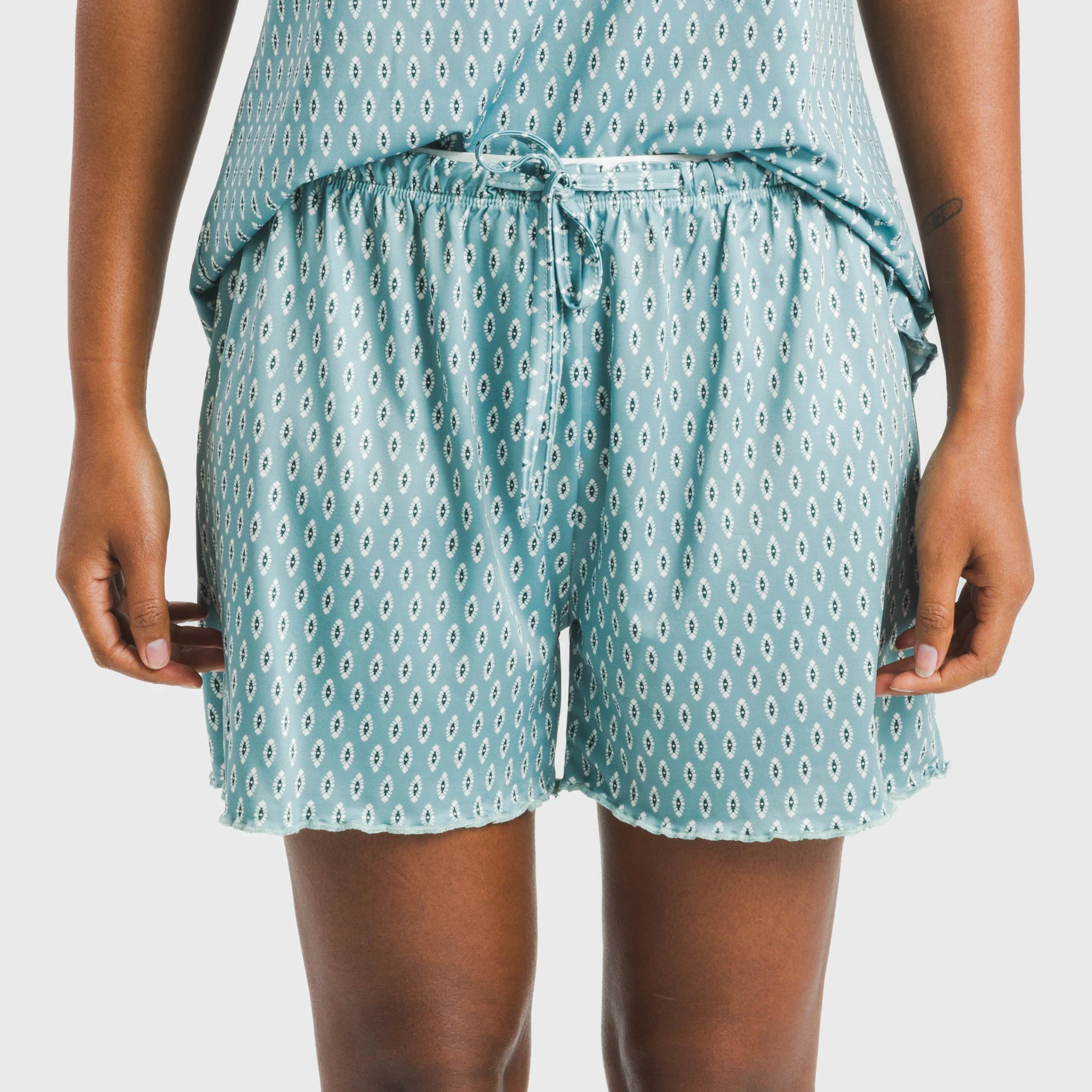 Pijama feminino Walia estilo tipi, macio e na cor azul-turquesa.