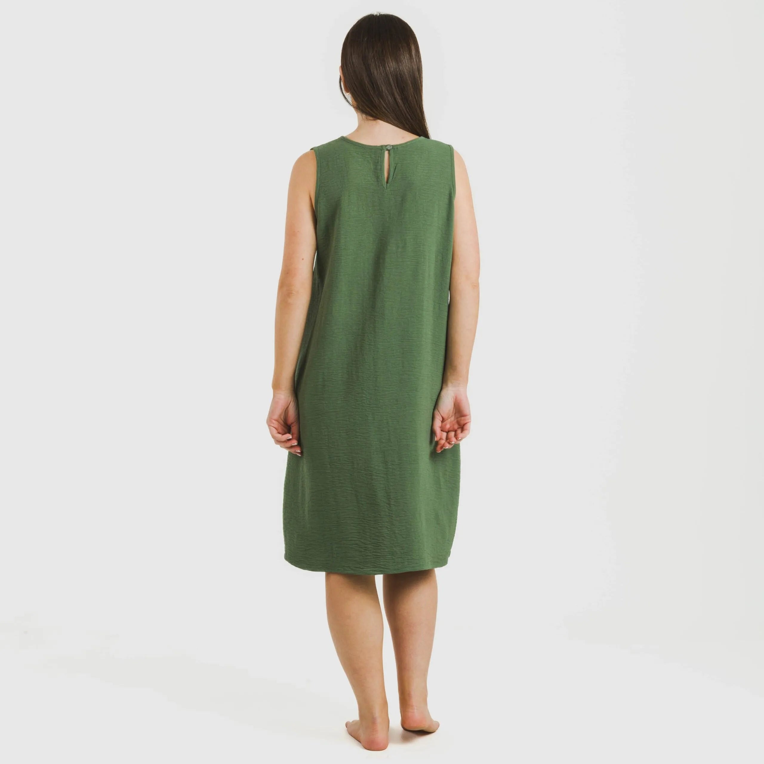 Vestido curto com alças, em musselina de algodão lisa.