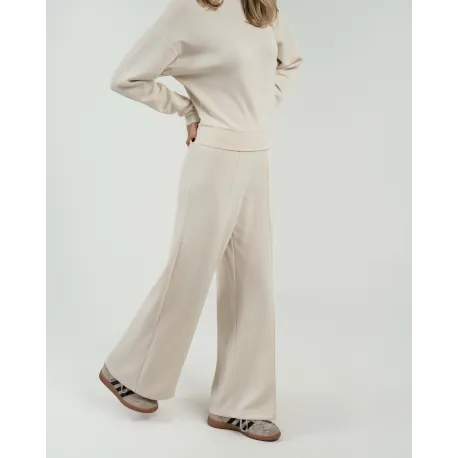 Calças compridas fluidas com pregas mulher