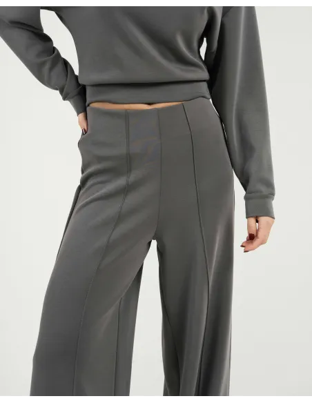 Calças compridas fluidas com pregas mulher