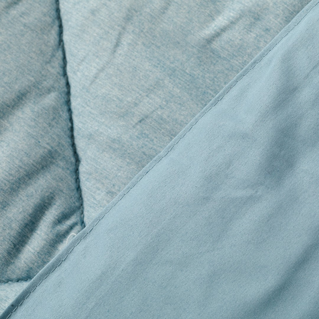 Edredom liso com efeito desgastado