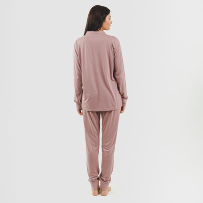 Conjunto de treino feminino lilás com jaqueta e zíper.