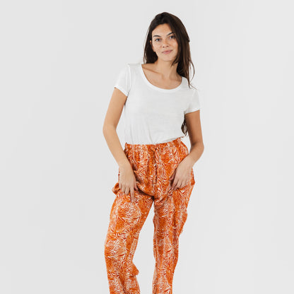 Calças de viscose. Sola cor terracota.