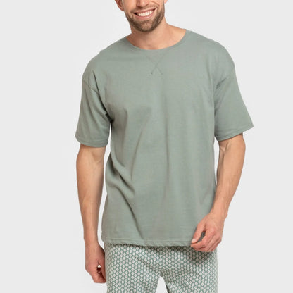 Pijama curto masculino de algodão na cor verde-azulado, estilo ousado.