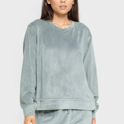 Pijama de veludo liso super macio na cor azul-turquesa.